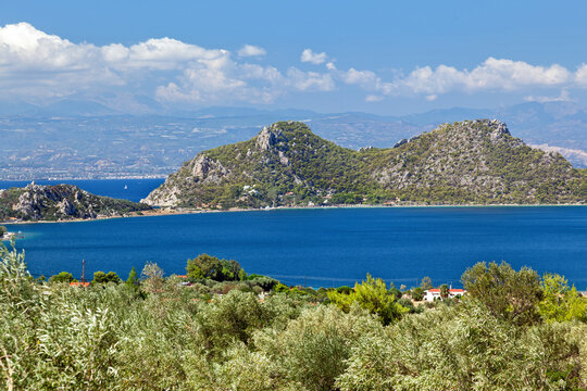 Panoramic view of Perachora lake, a natural reserve surrounded by olive groves, near the town of Loutraki, in Corinth region, Greece, Europe. 