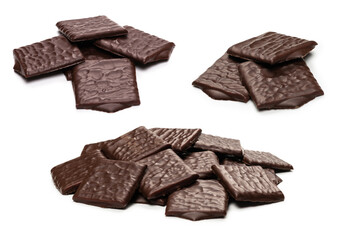Dark chocolate candies isolated on white background.