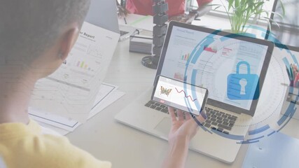 Office colleagues starting secure NFT sale by scanning report and activating padlock with circuits - Powered by Adobe