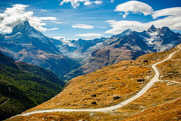 View of the Matterhorn peak and the mountain road leading into the valley