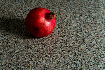 Fresh pomegranate fruit with seeds, rich in antioxidants, vitamins, and health benefits, perfect...