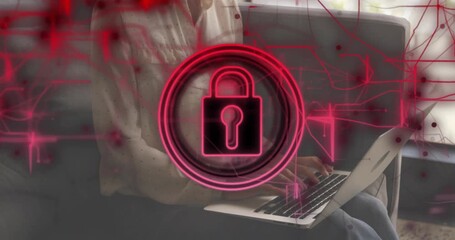 Woman typing on laptop while red lines forming grid around pulsing padlock icon indicating security - Powered by Adobe