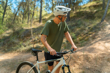 Obraz premium young man riding a bike