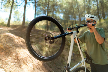 Fototapeta premium young man riding a bicycle