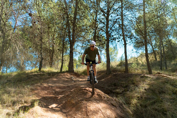 Obraz premium cycling in the forest