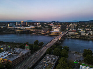 Fototapeta premium Aerial landscape of Central downtown Portland Willamette river city skyline summer night Oregon