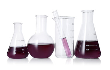 Different laboratory glassware with color liquid isolated on white