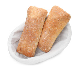 Tasty fresh ciabattas in basket isolated on white, above view