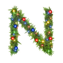 The letter N is decorated with green festive garland and colorful lights.