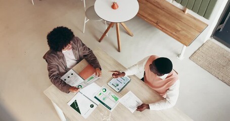 Handshake, above and business people with deal, partnership and collaboration for financial growth. Analyst, shaking hands and meeting for agreement in cafe, company info and data records for trust. - Powered by Adobe