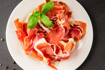 jamon serrano meat appetizer jamon iberico natural product tasty snack fresh delicious gourmet food background on the table rustic top view copy space