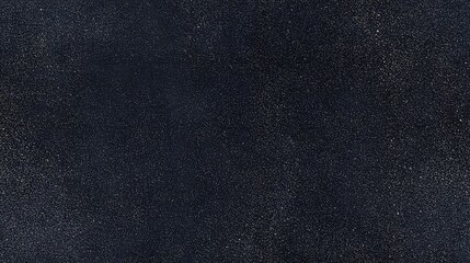 Dark textured background with shimmering particles
