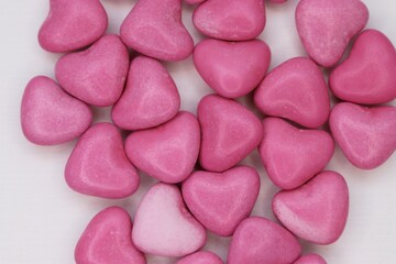 A light pink heart among pink ones: a symbol of tenderness, choice, and emotional uniqueness