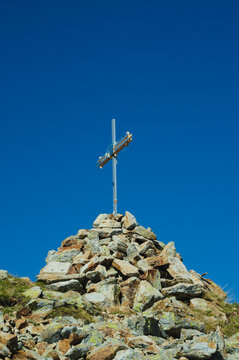 Cross on the top of mount Cima Venina, Lombardy, Italy 