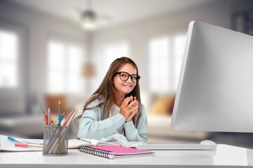 Young girl student learning on computer