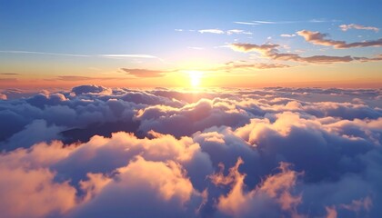 Stunning aerial view of sunset above fluffy clouds in the blue sky