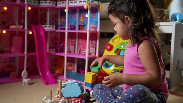 Little Girl Playing with Shape Sorter Toy