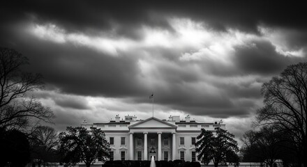 The White House under a dramatic, stormy sky, captured in monochrome.
