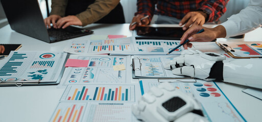 An innovative office setting where artificial intelligence assists in market analysis and strategic discussions, showcasing the collaboration between technology and business. Noogenesis AI