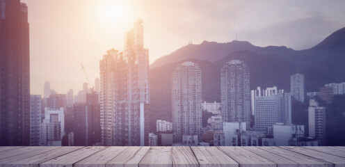 Hong kong skyline, mountains, wooden deck. Perfect for travel brochures, online articles, and social media posts showcasing city landscapes.