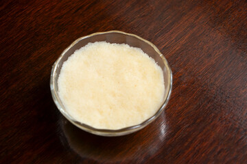 Sujir Halwa or Shuji Halwa Traditional Semolina Pudding Dessert in bowl side view of bangladeshi food