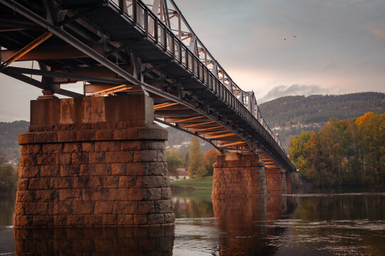 bridge over the river at sunset