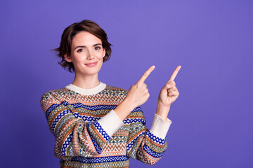 Photo of lovely pretty woman wear stylish clothes recommend banner empty space isolated on purple...