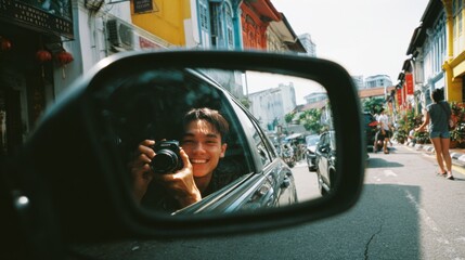 Naklejka premium a cool stylish young malay man laughing looking at the side mirror of a car, in the reflection there are two other young malay guys laughing and having fun roadtrip 