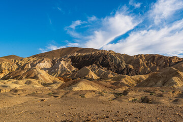 Striped Eroded Hills with Blue Sky and Wispy Clouds, 20 Mule Team Canyon, Death Valley National Park