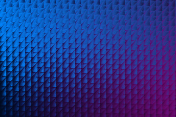 A visually striking abstract background with a gradient of blue and purple, showcasing a textured surface and geometric pattern for a modern and dynamic design