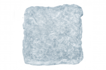 Ice block with a range of textures and a serene blue tint set against a clear background, symbolizing icy, frozen, and chilling themes