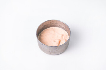 Spicy sauce in metal bowl for dipping