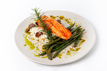 Pan seared salmon fillet serving with truffle risotto, green beans