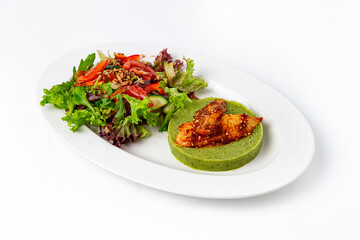 Healthy roasted chicken with green puree and fresh salad