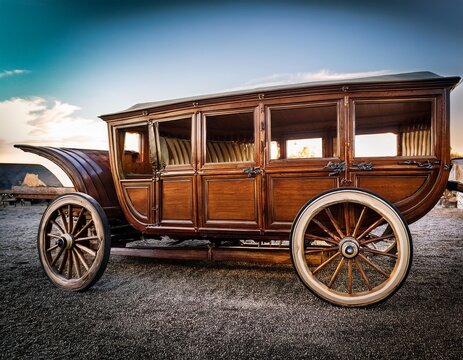 old and dusty wooden hearse carriage from the 19th century