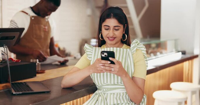 Internet, business and woman in cafe, smartphone and typing with social media, texting and email. Person, customer and cellphone in restaurant, network and digital app with communication and contact