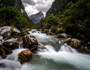 Mountain river cascading through a rocky gorge