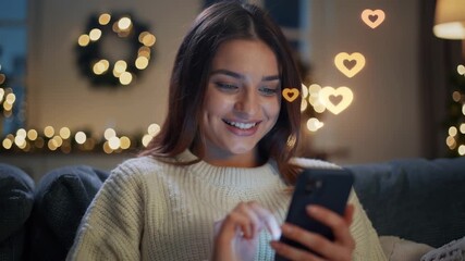 Young woman using smartphone with floating social media icons of likes and hearts, concept of online interaction, engagement, communication and digital lifestyle. - Powered by Adobe