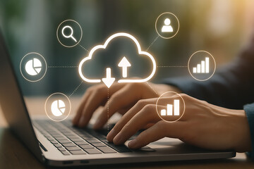 Person working on laptop with glowing cloud computing storage icons and data analytics technology interface concept