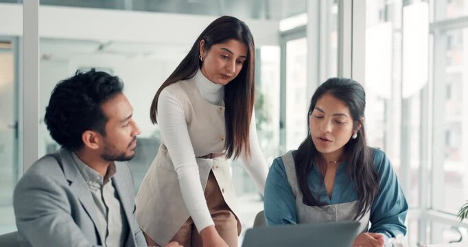 Business, planning or people with laptop in meeting for headline ideas, article review or feedback. Publishing team, journalists or editor with tech at agency for fact checking, advice or cooperation