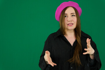 Collection of videos with young European woman in pink beret on green background expressing different emotions smiling thinking gesturing pointing down adjusting hair and posing with copy space.