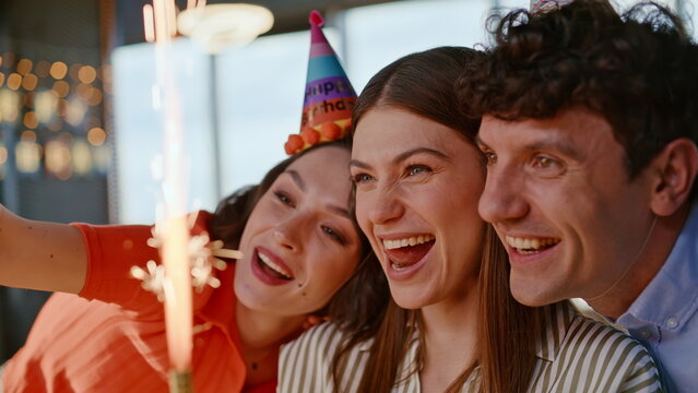 Happy colleagues enjoy birthday celebration at office party together closeup - Powered by Adobe