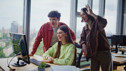 Friendly coworkers greeting webcam laptop team video meeting in conference room