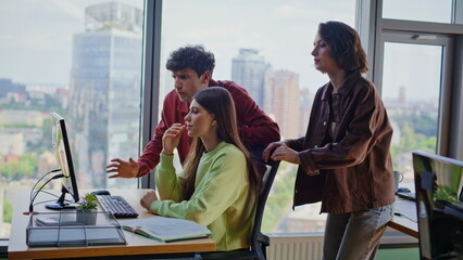 Business team frustrated loss looking computer cityscape coworking space closeup