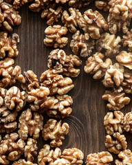 Top down view of whole walnuts with copy spaces.