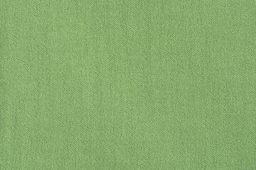 Fototapeta premium Green fabric texture macro photo as background.