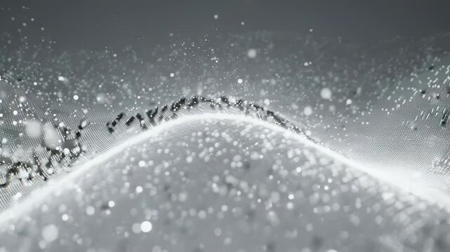 Abstract wave of particles with bokeh effect in grayscale. Digital art with a futuristic feel