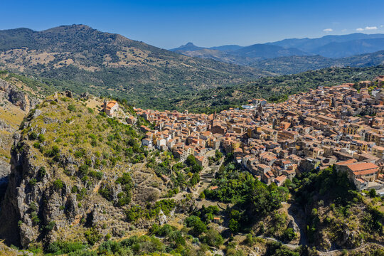 Aerial drone view of Isnello historic Sicilian mountain village with traditional stone buildings and old architecture in summer Madonie Natural Park Sicily Italy Mediterranean landscape panorama