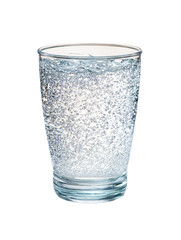 Glass of sparkling water with bubbles against a black background.