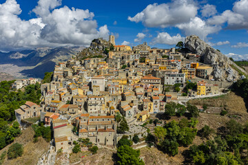 Aerial drone view of Sclafani Bagni, a small historic Sicilian mountain town perched on cliffs with panoramic views of Caltavuturo and rugged Madonie Mountains, Sicily, Italy.Small Village in Sicily